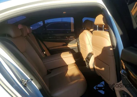 2015 BMW 740 I z USA, uszkodzony, nr VIN WBAYA6C57FG16659